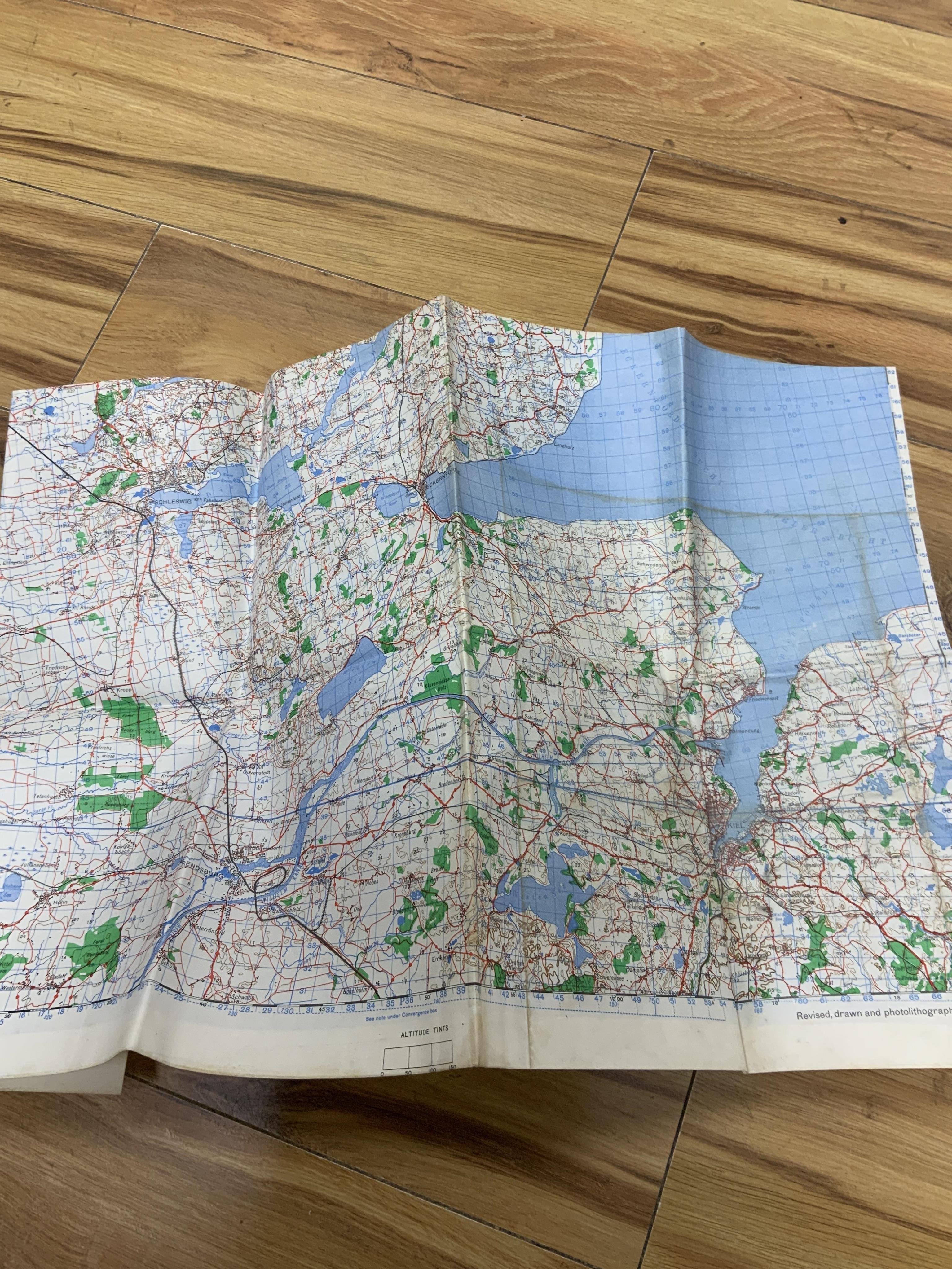 WWII D-Day and Operation Neptune related interest; an archive of mainly naval documents, maps and photographs relating to the invasion of Juno beach, 6 June 1944, comprising; the personal papers, maps, and other document